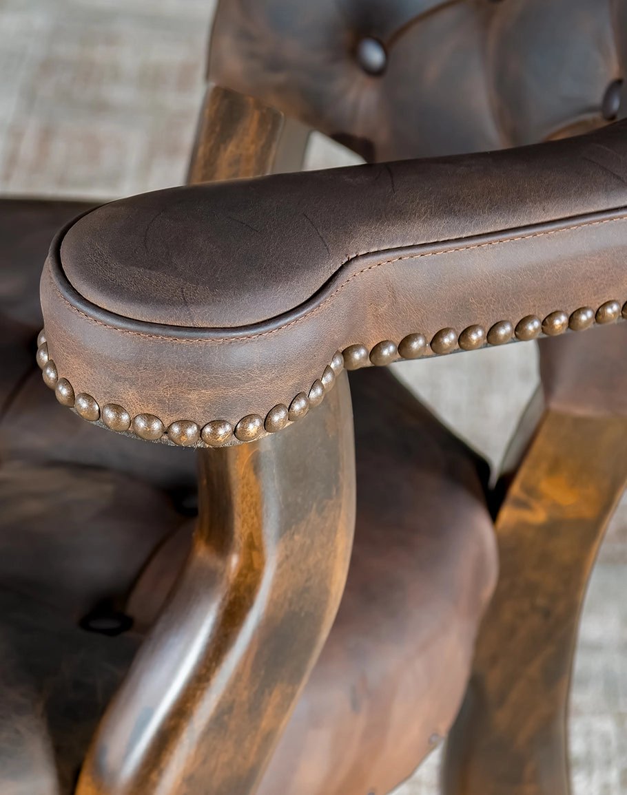 Axis Hide & Leather Upholstered Castor Chair