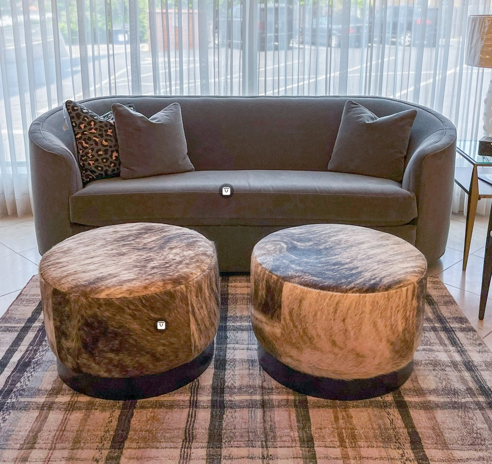 Eastwood Cowhide Swivel Ottoman