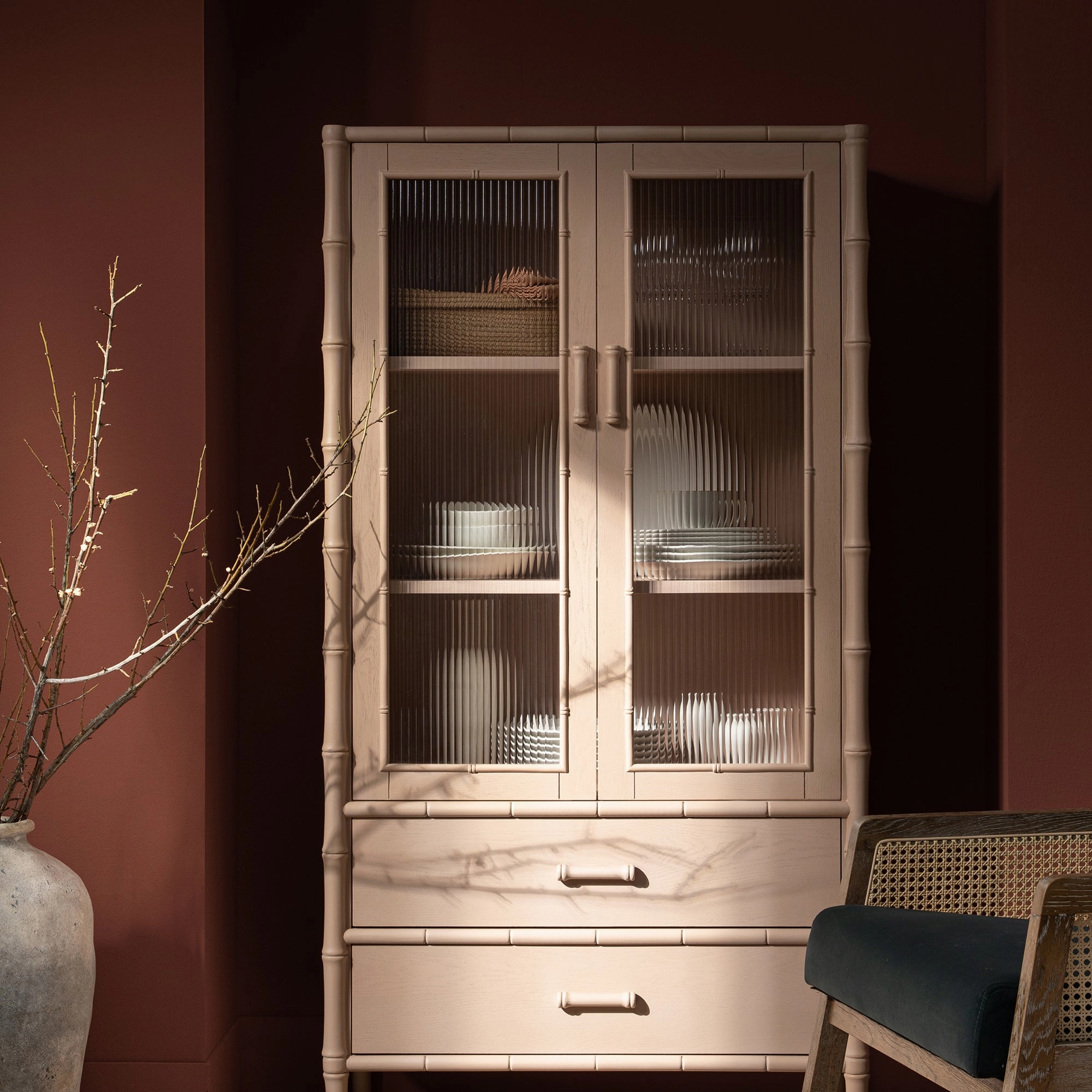 Elstowe Faux Bamboo and Fluted Glass 2-Door Cabinet, Nude Pink