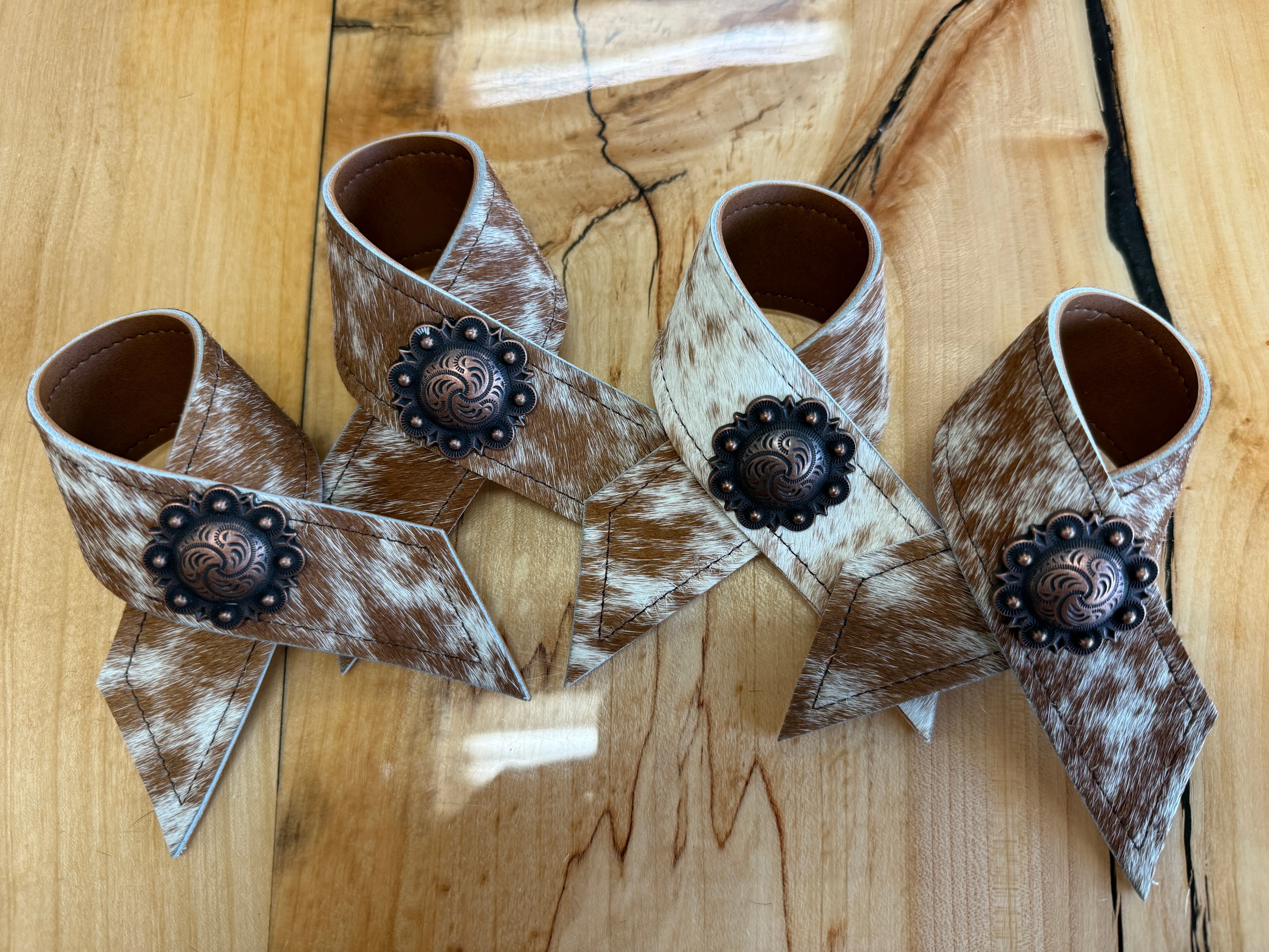 Peppered Brown White Cowhide Concho Napkin Rings