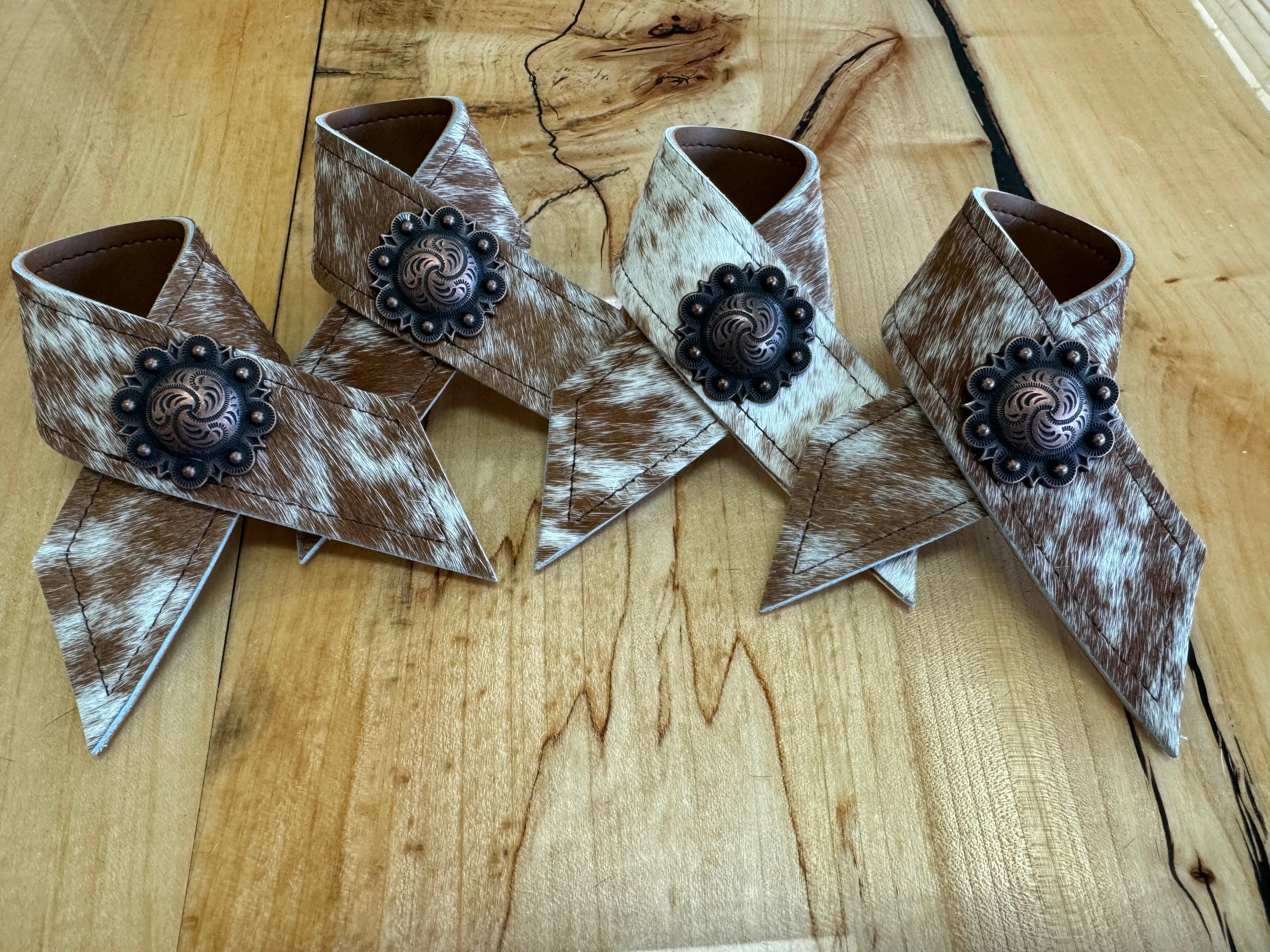 Peppered Brown White Cowhide Concho Napkin Rings