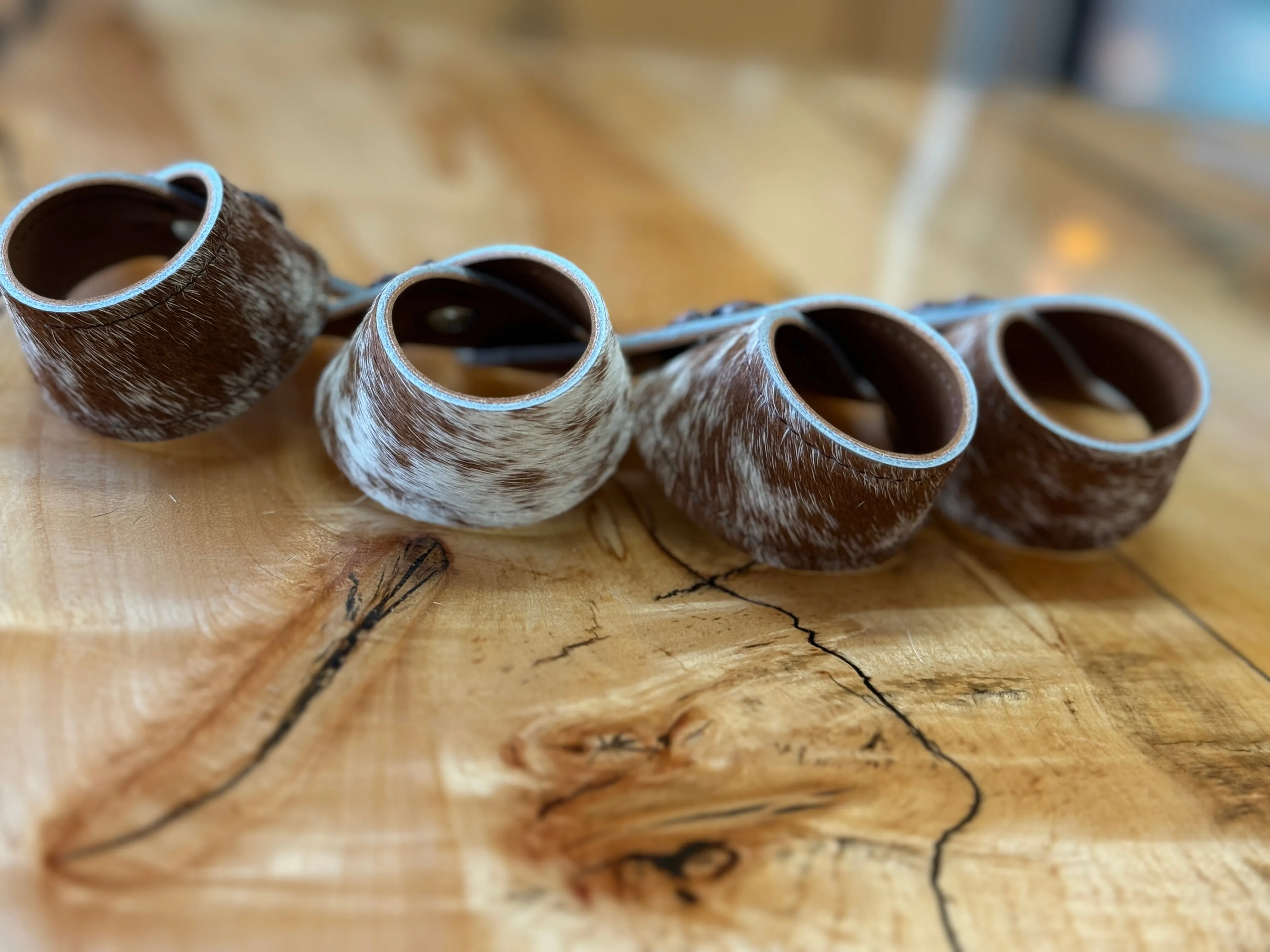 Peppered Brown White Cowhide Concho Napkin Rings